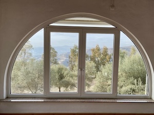 Renovation: Old wood windows removed and replaced with double glass PVC doors. Finca Majarro. Sayalonga